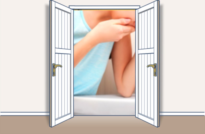 イメージ図:トイレで吐血する女性