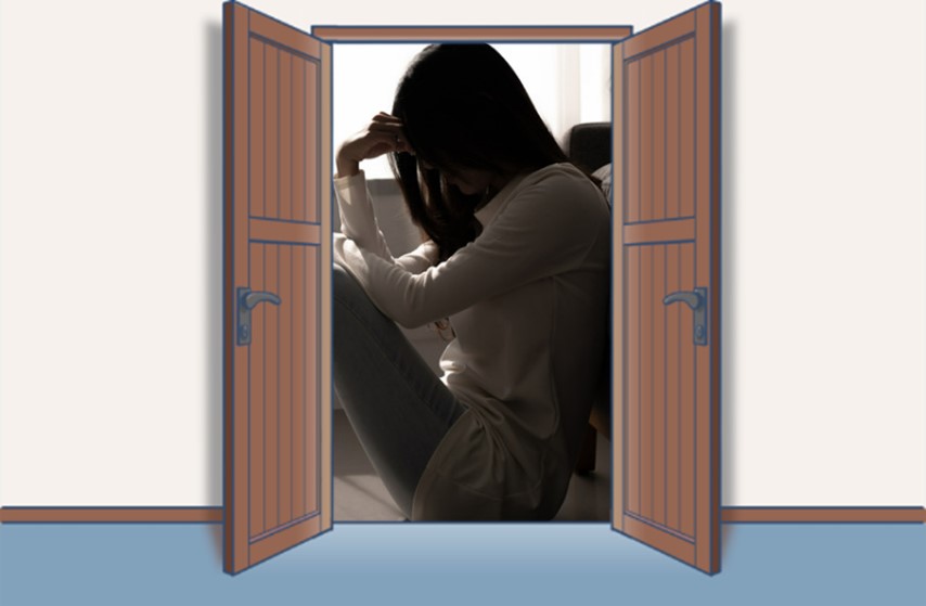 イメージ図:約束されていた「正社員への道」が急に崩れて落ち込む女性