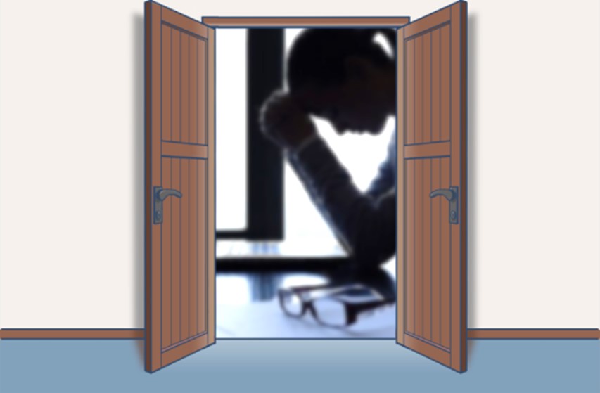 心身の不調に悩む仕事中の女性イメージ