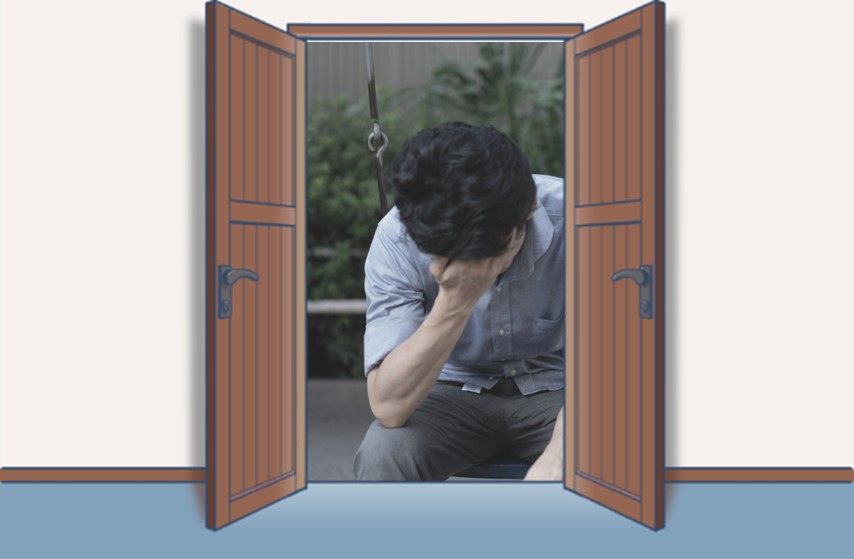 悩む男性